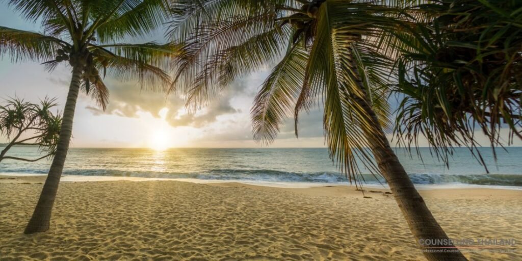 Peaceful beach at sunset – symbolising emotional wellbeing when retiring in Thailand